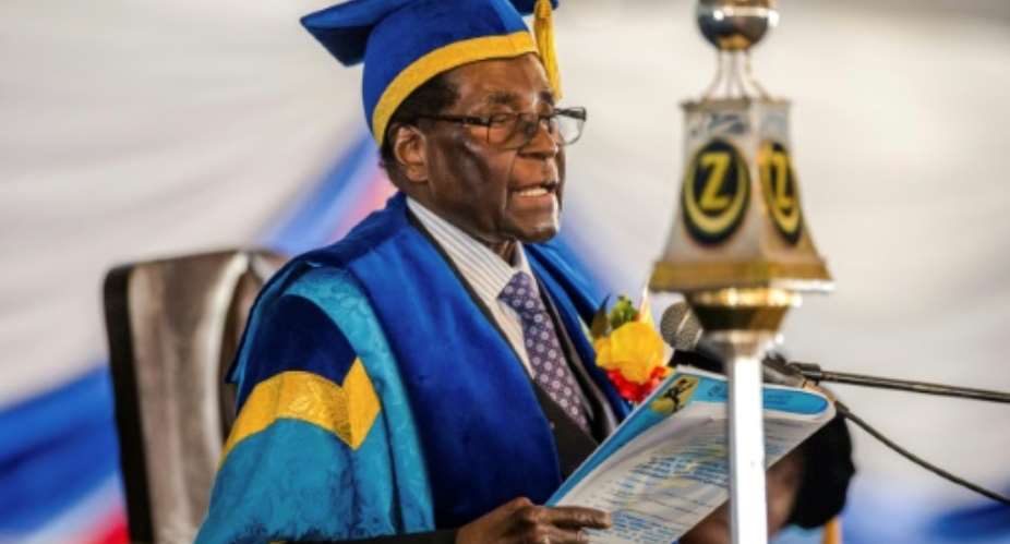In his last public appearance on Friday, Robert Mugabe made no reference to the ongoing crisis which ended up with his resignation on Tuesday.  By Jekesai NJIKIZANA AFPFile