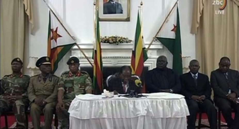 In his speech, telecast by the Zimbabwe Broadcasting corporation ZBC, Mugabe defied expectations he would quit and said he would preside over an upcoming party congress. He was flanked by the generals who are behind the country's military takeover.  By STR ZBCAFP