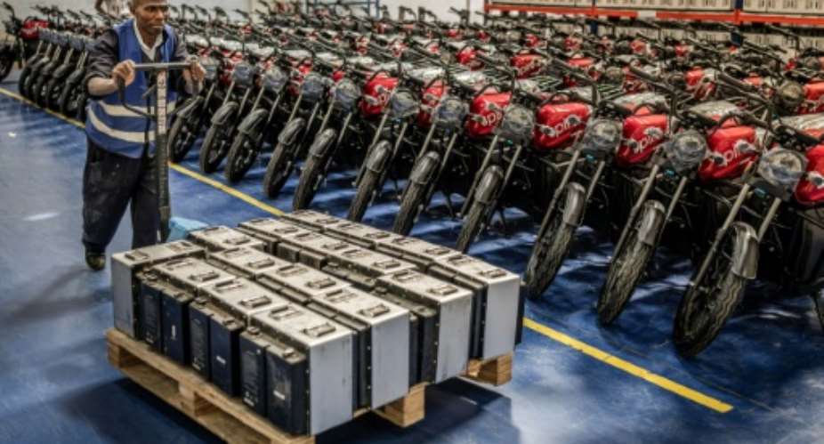 In Kenya, electric motorbikes have seen a 40-percent sales boost from the war in the Middle East.  By Luis TATO (AFP)