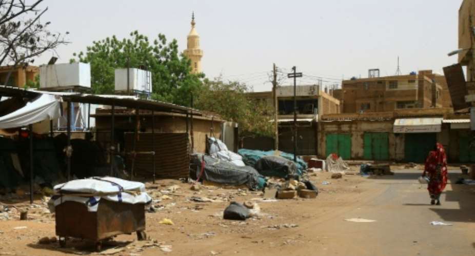 In Khartoum's twin city of Omdurman, across the River Nile, many shops and markets remained closed.  By - AFP