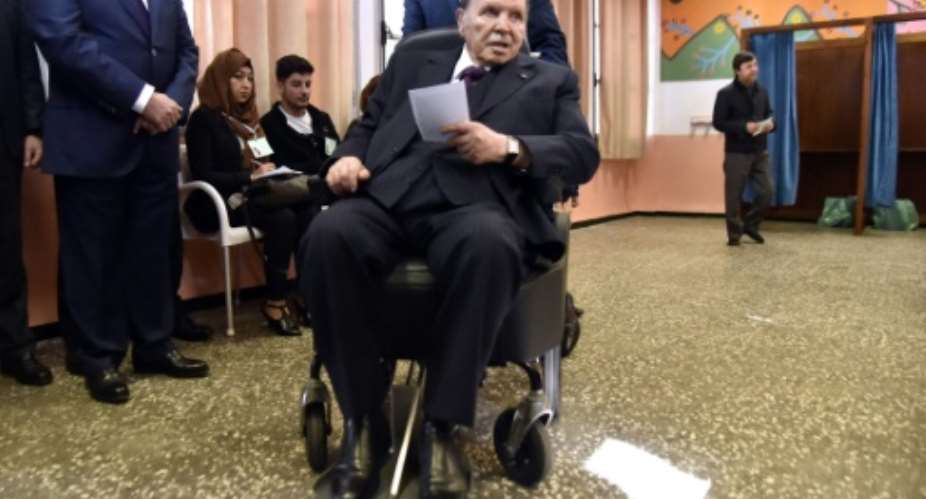In this file picture, Algerian President Abdelaziz Bouteflika votes at a polling station in Algiers on November 23, 2017 in local elections.  By RYAD KRAMDI AFP