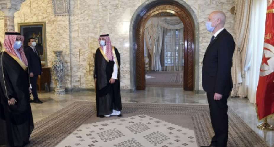 In Tunisia, Saudi Foreign Minister Faisal bin Farhan met with President Kais Saied at Carthage Palace in Carthage outside of the capital Tunis.  By - TUNISIAN PRESIDENCYAFP