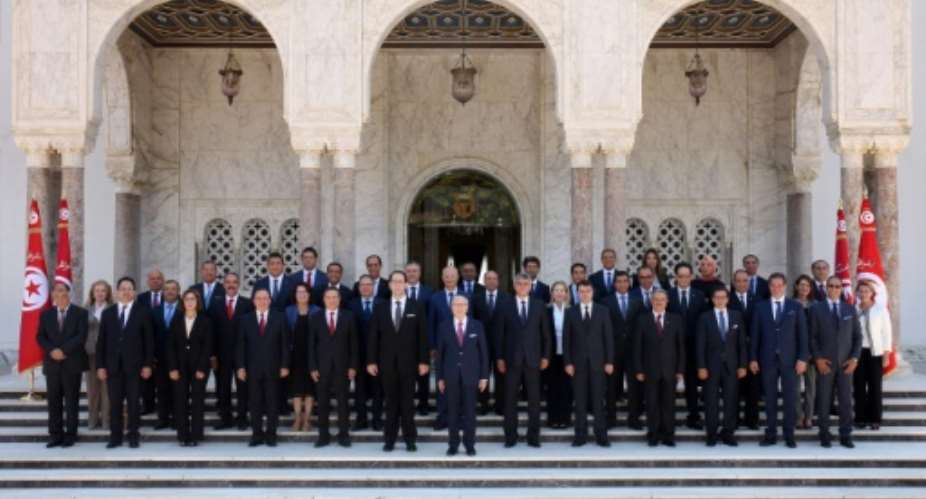In Tunisia, women have more access to senior positions than in other North African and Middle Eastern countries, but decision-making spaces such as the cabinet, pictured in 2016, are far from gender parity.  By HO TUNISIAN PRESIDENCYAFPFile