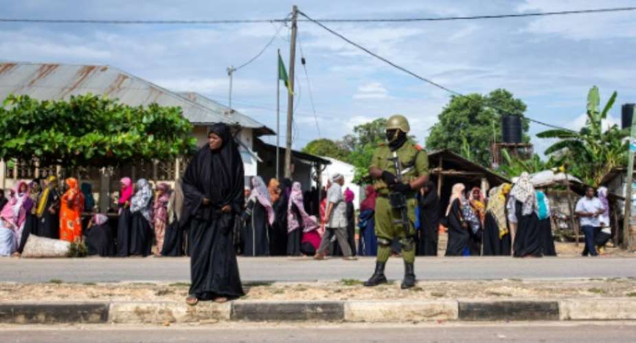 In Zanzibar hundreds of men and women formed separate queues from before dawn to vote in Garagara, outside the capital Stone Town.  By Patrick Meinhardt AFP