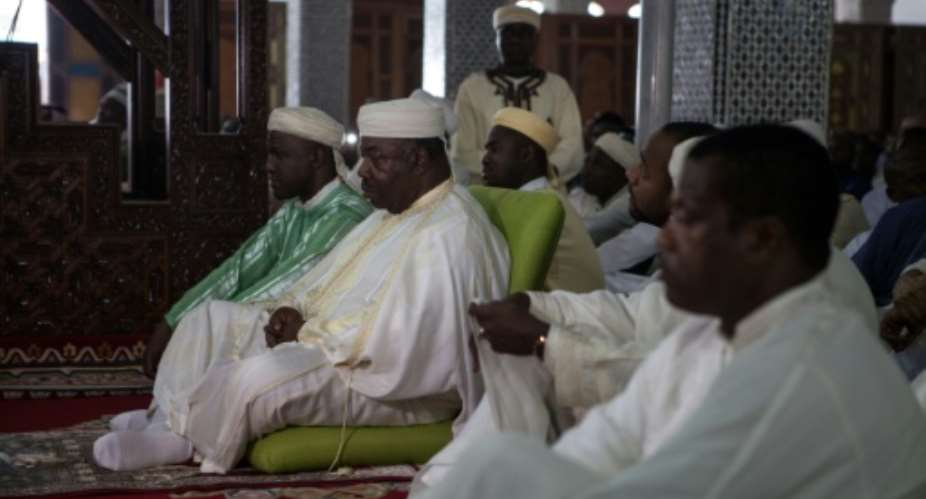 Incumbent Gabonese President Ali Bongo Ondimba attends prayers at the Assan II Mosque in Libreville on September 12, 2016.  By Florian Plaucheur AFPFile