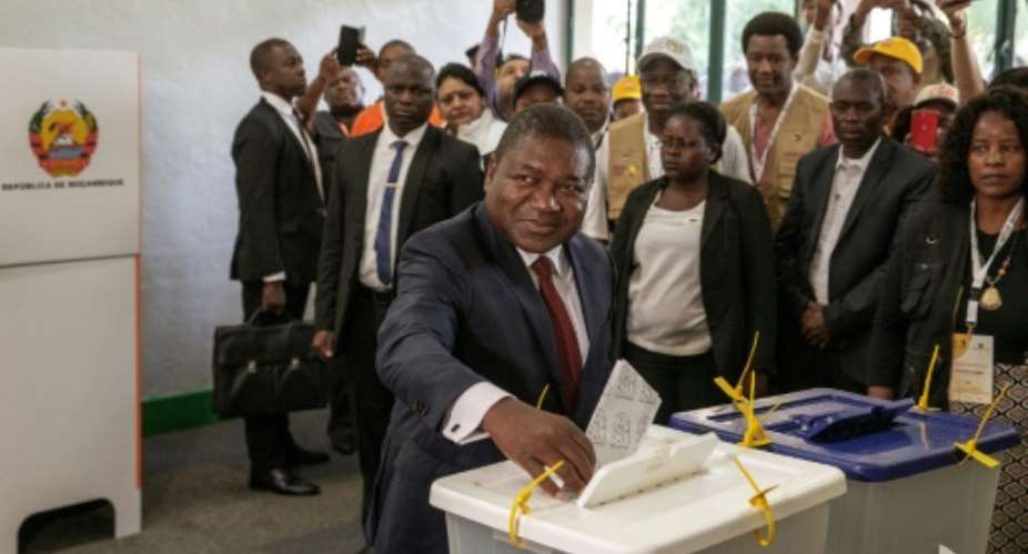 Incumbent President Filipe Nyusi won a new five-year term after his Frelimo party secured 73 percent of the vote.  By GIANLUIGI GUERCIA AFPFile