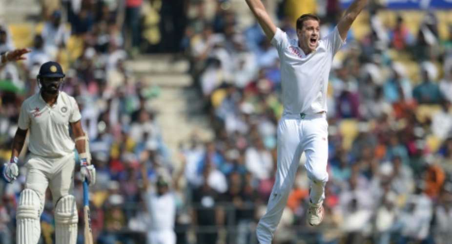 South Africa's Morne Morkel celebrates the wicket of India's Murali Vijay on the first day of the third Test in Nagpur on November 25, 2015.  By Indranil Mukherjee AFP