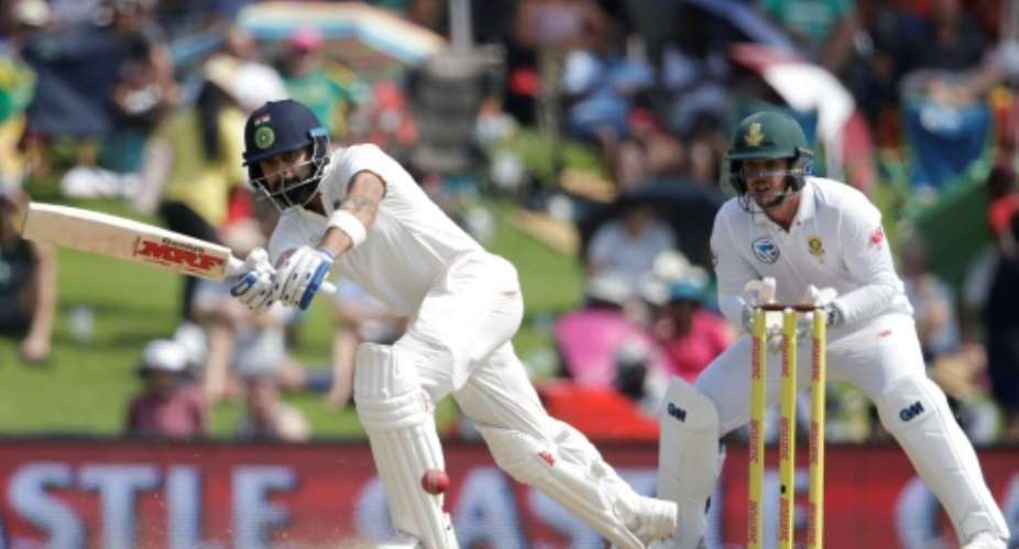 India captain Virat Kohli plays a shot during the second day of the second Test against South Africa at Supersport cricket ground in Centurion, South Africa on January 14, 2018.  By Gianluigi GUERCIA AFP