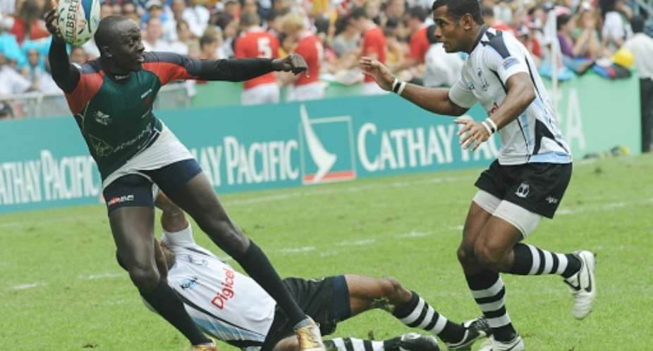 Innocent Simiyu left, pictured during the 2008 Hong Kong Sevens, has been reappointed Kenya 7s coach.  By MIKE CLARKE AFPFile