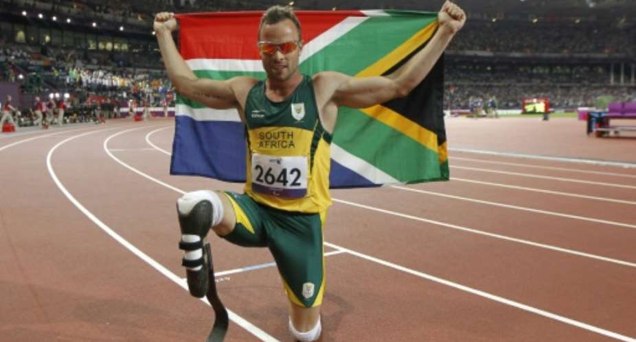 South Africa's Oscar Pistorius poses at the London Paralympic Games on September 8, 2012.  By Ian Kington AFPFile