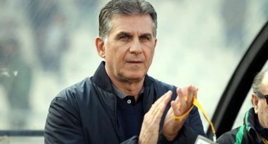 Iran's Portuguese coach Carlos Queiroz attends his team's 2015 AFC Asian Cup qualifying match against Lebanon at the Azadi Stadium in Tehran on February 6, 2013.  By Atta Kenare AFPFile