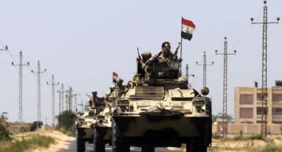 Egyptian soldiers in the area of the Rafah Crossing border between Egypt and the Gaza Strip on May 21, 2013.  By  AFPFile