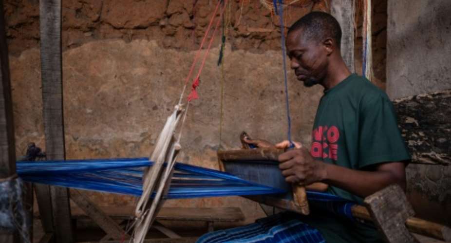 Iseyin in southwestern Nigeria is considered the home of aso-oke, a handwoven fabric.  By TOYIN ADEDOKUN (AFP)