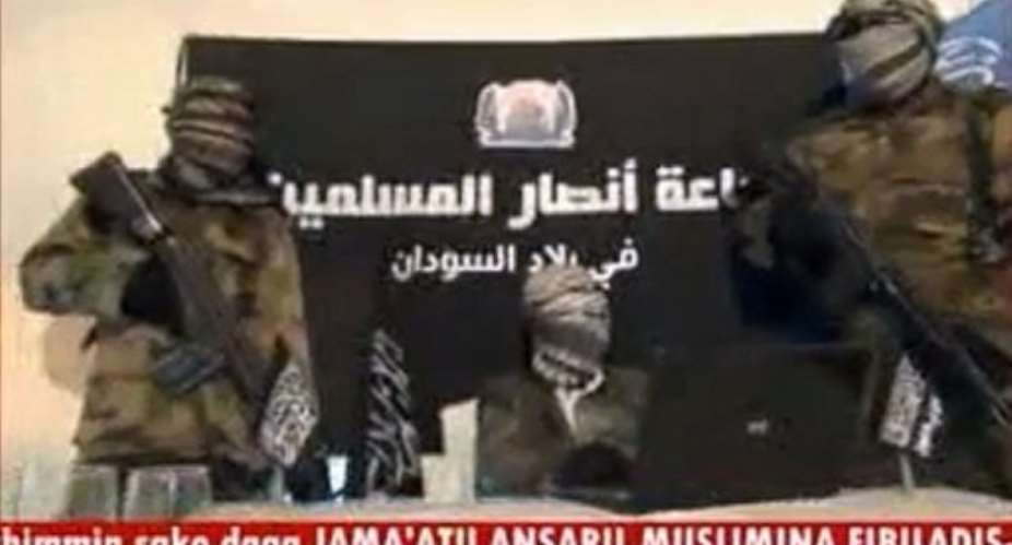 An image from a video released by Ansaru reportedly shows unidentified members of the group in November 2012.  By  AnsaruAFPFile