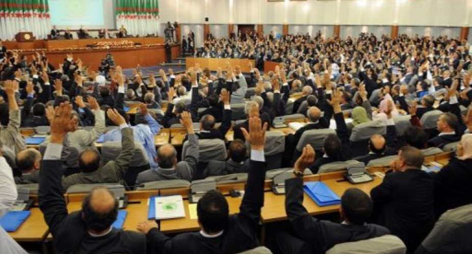 Algerian MPs vote during a special parliamentary session in 2008.  By Fayez Nureldine AFPFile