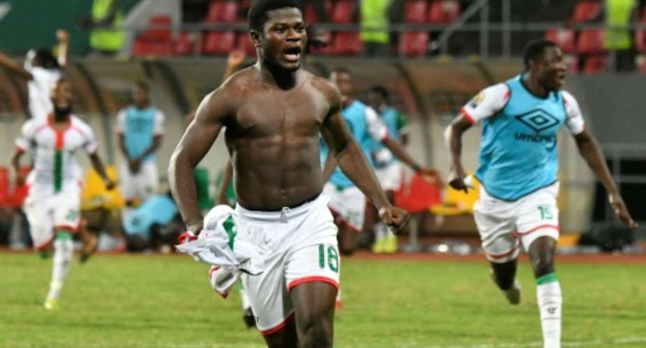 Ismahila Ouedraogo celebrates after sending Burkina Faso through to the Africa Cup of Nations quarter-finals.  By Issouf SANOGO AFP