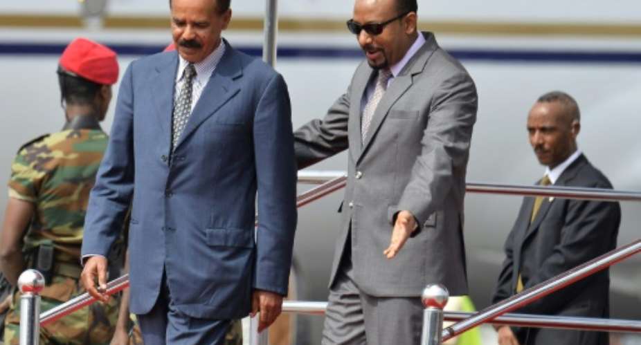 Issaias was welcomed by Abiy on his arrival for the historic visit.  By MICHAEL TEWELDE AFPFile