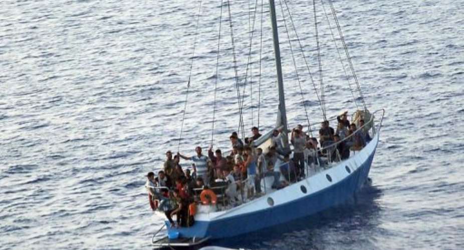 A ship carrying 65 illegal immigrants heads towards Italy on July 2.  By  (AFP/HO/File)