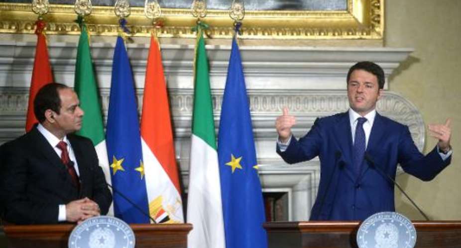 Egyptian President Abdel Fattah al-Sisi L and Italian Prime Minister Matteo Renzi speak during a news conference following their meeting at Villa Madama in Rome on November 24, 2014.  By Filippo Monteforte AFP