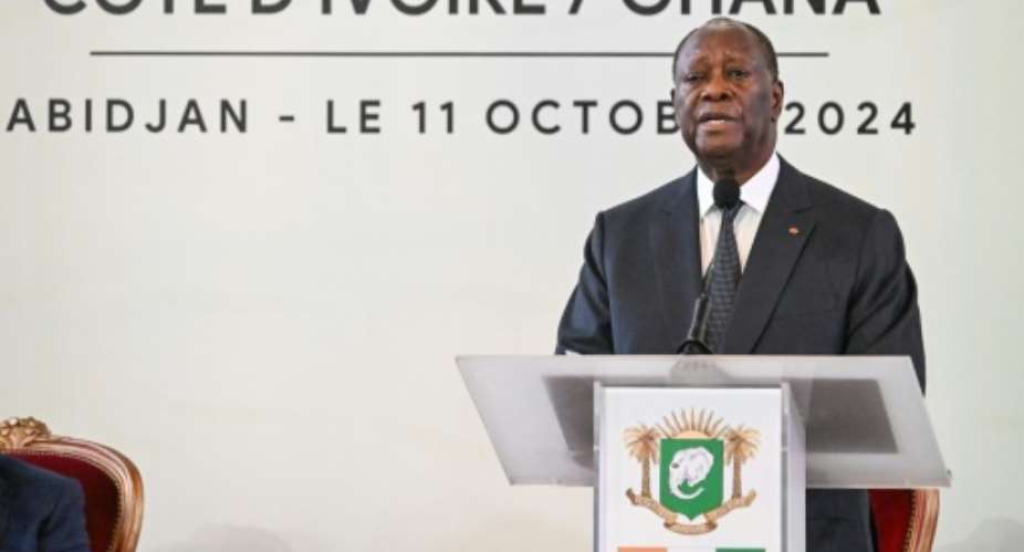 Ivorian President Ouattara said the upcoming elections would unfold peacefully.  By Sia KAMBOU (AFP/File)