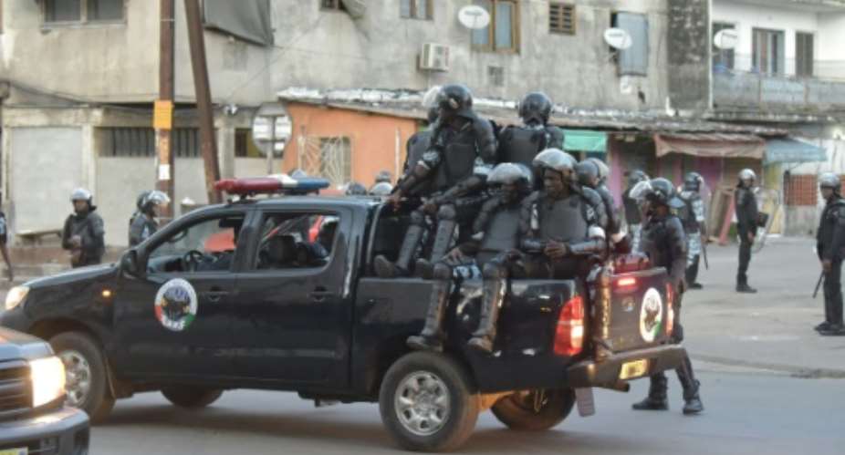 Ivorian riot police officers fanned out across many areas in anticipation of violence linked to Saturday's tense election.  By SIA KAMBOU AFP