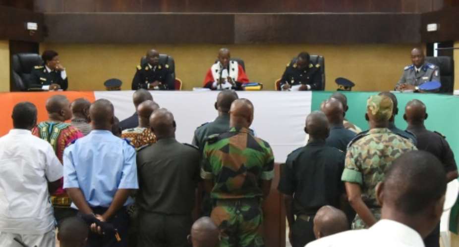 A trial hearing in Abidjan on December 17, 2015 of the suspected killers of Robert Guei.  By Sia Kambou AFP