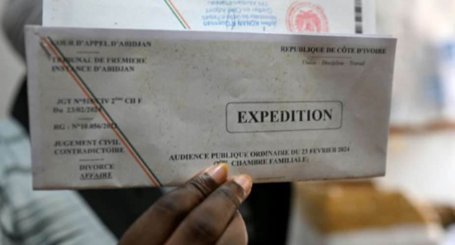 Ivory Coast has a low divorce rate, with the fear of social disapproval weighing on many women.  By Issouf SANOGO (AFP)