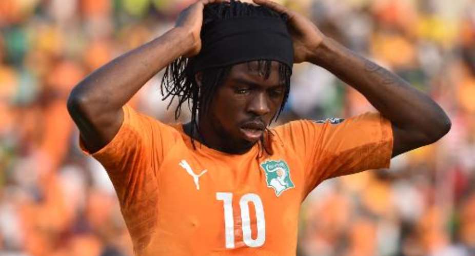 Gervinho reacts after being sent off during the African Cup of Nations match between Ivory Coast and Guinea in Malabo on January 20, 2015.  By Issouf Sanogo AFP