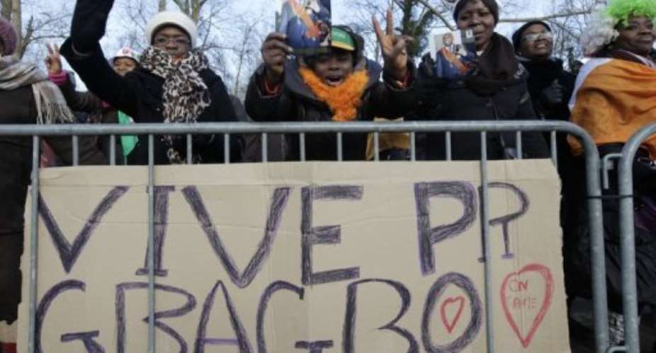 A pro-Gbagbo rally outside the International Criminal Court in The Hague.  By Anoek de Groot AFP