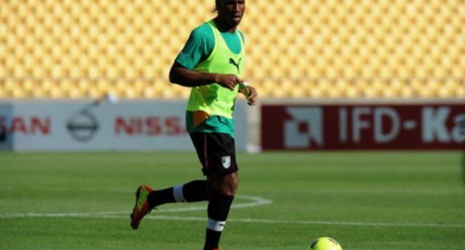 Ivory Coast Forward Didier Drogba runs during a training session in Rustenburg on January 21, 2013.  By Alexander Joe AFPFile