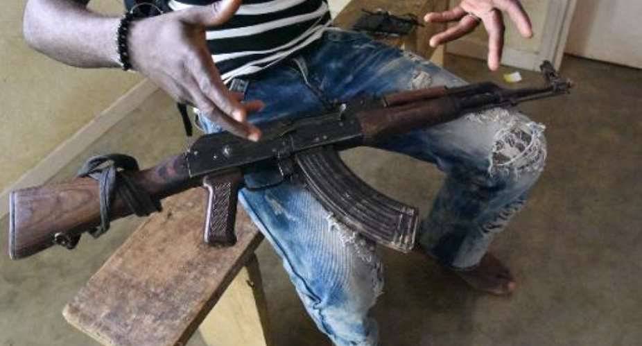 Ivory Coast's former rebels cling to their weapons