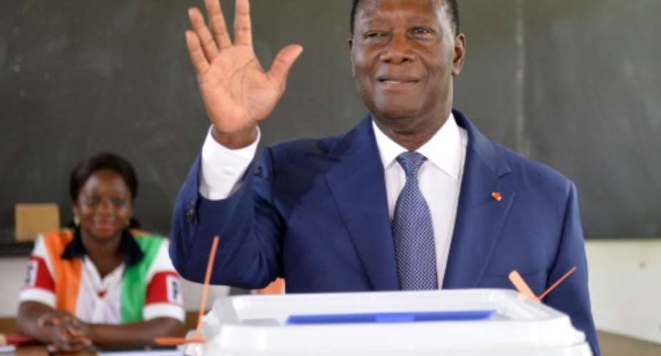 Ivory Coasts President Alassane Ouattara (R) says the revised constitution could end years of stability.  By Sia Kambou (AFP/File)