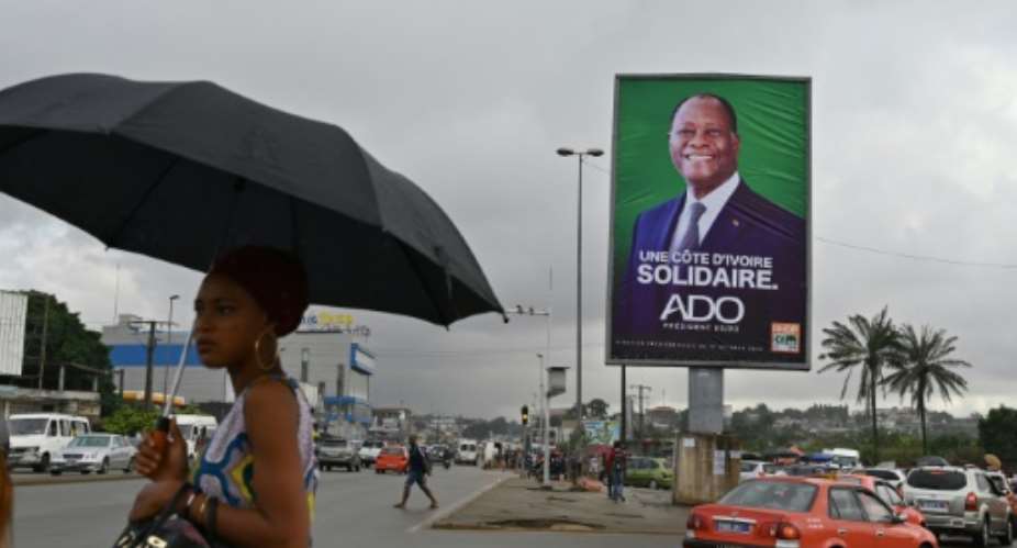 Ivory Coast's President Alassane Ouattara, seen here in a campaign poster, is running for a third term in defiance of a constitutional limit.  By Issouf SANOGO AFPFile