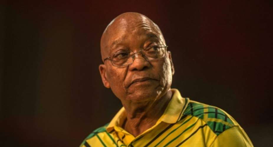 Jacob Zuma, pictured in 2017, is embroiled in a corruption probe.  By MUJAHID SAFODIEN AFPFile