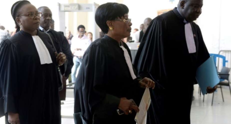 Jacqueline Moudeina C and Assane Dilma Ndiaye R, lawyers of the plaintiffs in the case of former Chadian dictator Hissene Habre, arrive to the Appeal Court of the Extraordinary African Chambers CAE on April, 27, 2017 in Dakar.  By SEYLLOU AFP
