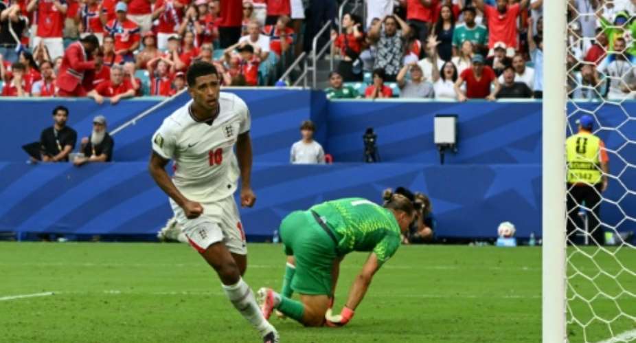 Jude Bellingham scores Englands match-winning second goal.  By ROBERTO SCHMIDT (AFP)