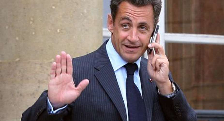 File picture taken on August 27, 2007 shows French President Nicolas Sarkozy talking on his mobile at the Elysee Palace in Paris.  By Thomas Coex AFPFile
