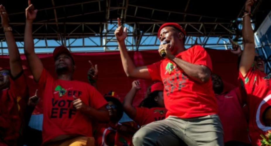 Julius Malema Malema is the self-styled commander-in-chief of the Economic Freedom Fighters EFF, a radical-left party.  By Michele Spatari AFP