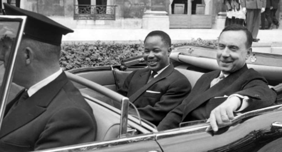 July 1960: Cameroon's first post-independence president, Ahmadou Ahidjo, left, on an official visit to Paris alongside French Prime Minister Michel Debre.  By  AFP