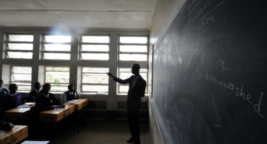Junior lecturers in Kenya currently earn around 500 470 euros a month while professors earn up to 2,000 1,900 euros.  By TONY KARUMBA AFP