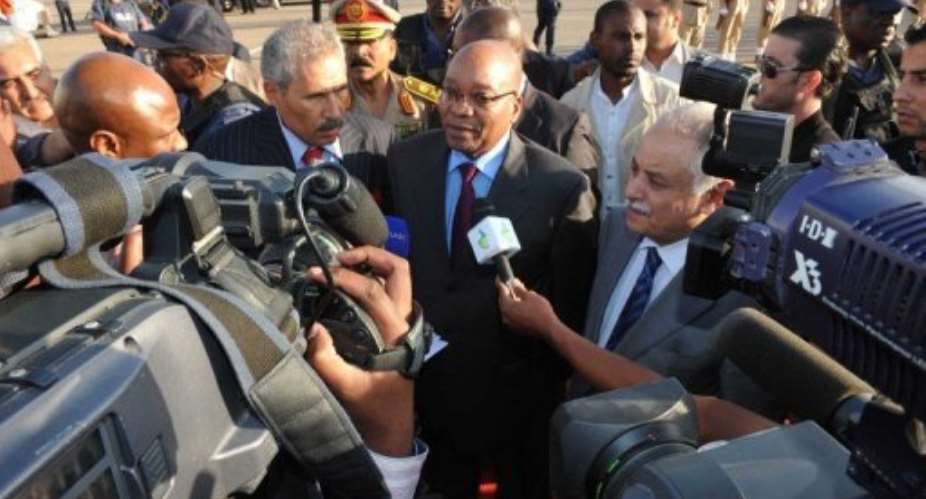 South African President Jacob Zuma (C) speaks to the press with Libyan Prime Minister Baghdadi al-Mahmudi (R).  By Ntswe Mokoena (AFP/HO/File)