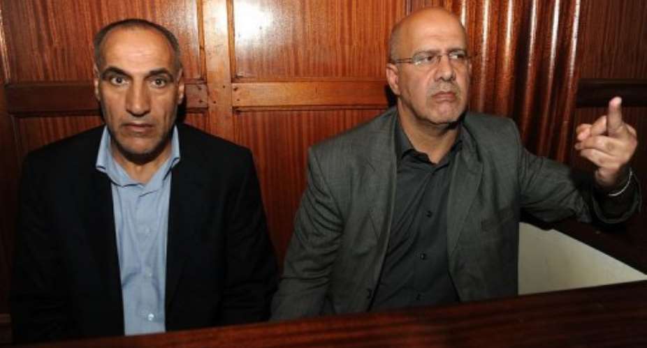 Ahmed Mohammed (right) and Sayed Mansour in court in Nairobi on May 6, 2013 after sentencing on terror-related charges.  By Simon Maina (AFP)