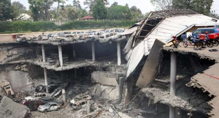 A handout picture from the Kenyan presidency shows a destroyed section of the Westgate mall in Nairobi on September 26, 2013.  By  KENYAN PRESIDENCYAFPFile