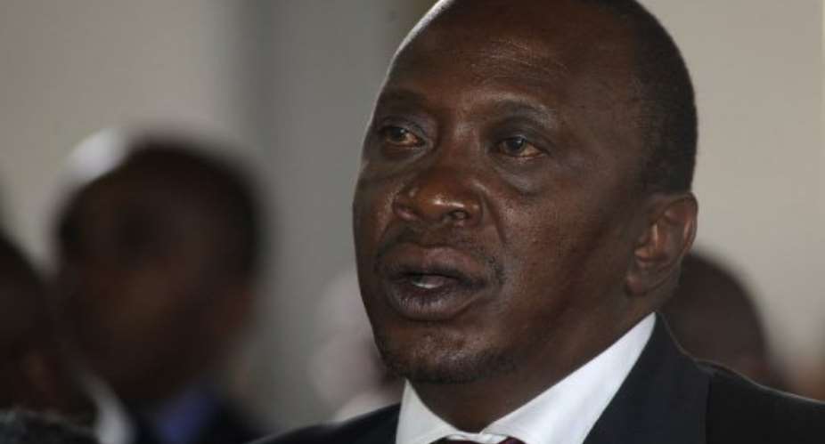 Kenyas newly elected President Uhuru Kenyatta at the Martyrs of Uganda Catholic church in Gatundu on March 10, 2013..  By Simon Maina (AFP/File)