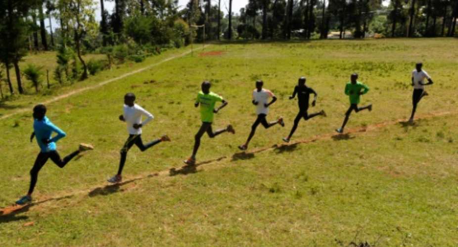 Kenyan athletes run during their training session in Iten in the Rift Valley, 329 kms north of Nairobi, on January 13, 2016.  By Simon Maina AFPFile