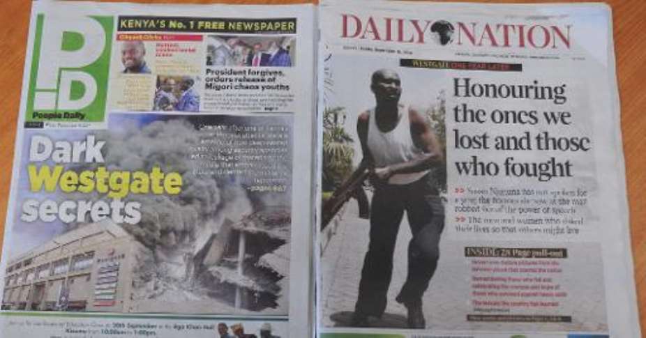 Kenyan newspapers with headlines on the Westgate mall terror attack are pictured on September 19, 2014.  By Simon Maina AFP
