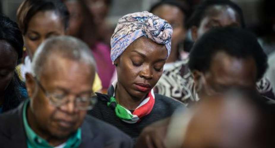 Hundreds gather for an Easter service at the All Saints' Cathedral in Nairobi on April 5, 2015, mourning one of the country's worst ever massacres.  By Nichole Sobecki AFP