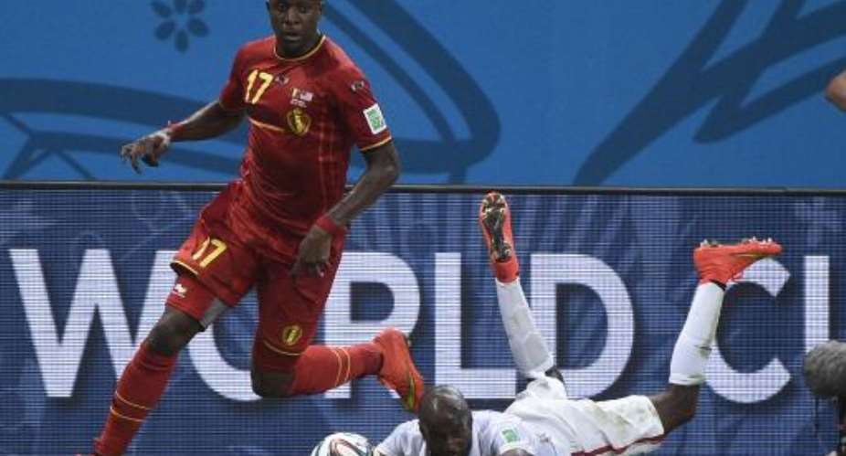 Belgium's forward Divock Origi left vies with US defender DaMarcus Beasley during a round of 16 match at Fonte Nova Arena in Salvador during the 2014 FIFA World Cup on July 1, 2014.  By Martin Bureau AFPFile