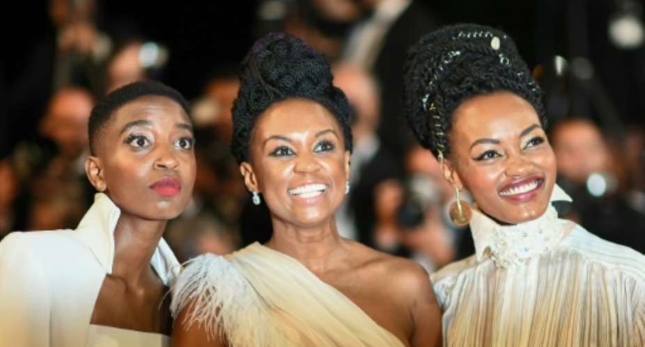 Kenyan actress Samantha Mugatsia, director Wanuri Kahiu, and actress Sheila Munyiva at the 71st edition of the Cannes Film Festival in southern France..  By Anne-Christine POUJOULAT AFPFile