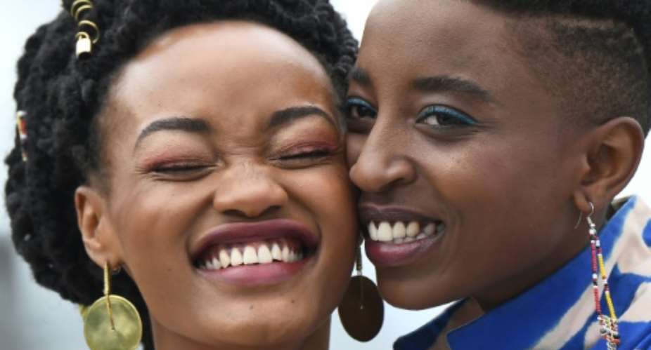 Kenyan actresses Sheila Munyiva, left, and Samantha Mugatsia, right, who star in the film Rafiki appeared together at the Cannes film festival.  By Anne-Christine POUJOULAT AFPFile